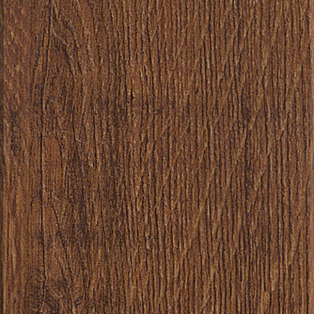Rich walnut-toned Luvanto Dryback Herringbone Tile with realistic wood finish. Durable LVT for contemporary interiors.