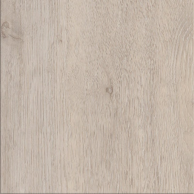 Pale oak Luvanto Dryback Herringbone Tile with fine wood texture. Durable LVT flooring for minimalist and Scandinavian interiors.