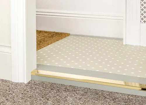 Polished brass flooring edge trim by Premier Trims. Perfect for step edges and multi-surface flooring transitions.