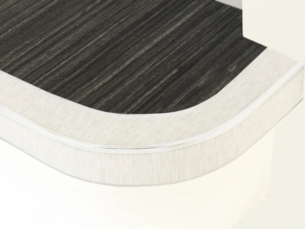Custom stair nosing in light wood finish with bendable edge, designed for curved steps by Premier Trims.