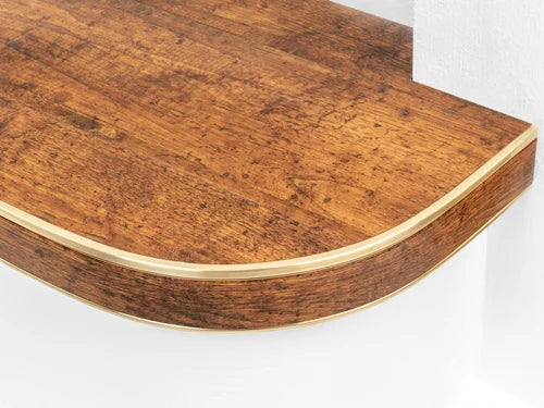 Close-up of bendable stair nosing in rustic wood finish, custom-fit for curved stair edges by Premier Trims.