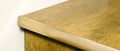 Premier Trims LVT Nosings in brushed brass finish installed on light oak stair edge for LVT stair protection and enhanced durability.