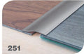 Max Reflections 251 stick-down ramp profile installed between 6mm wood and vinyl floors, offering a smooth, screw-free transition.
