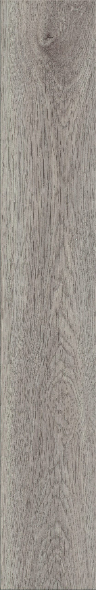 Luvanto Dryback Flooring in light grey herringbone wood texture, ideal for modern bathrooms and kitchens. Durable waterproof LVT tile.
