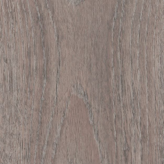 Luvanto Dryback Flooring in light grey herringbone wood texture, ideal for modern bathrooms and kitchens. Durable waterproof LVT tile.