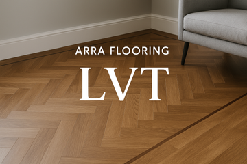 Arra Flooring LVT collection with herringbone and walnut border near baseboards