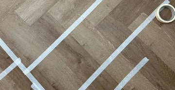 Official Stair Rods UK image showing Geordie Roll LVT tape used during flooring installation.