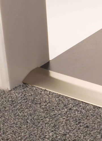 Premier Carpet Ramp — installed carpet-to-hard-floor transition