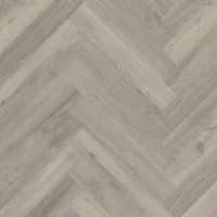 Wooden floor with a herringbone pattern in gray and beige tones.