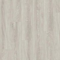 Close-up of a wooden surface with a light brown color and visible grain pattern.
